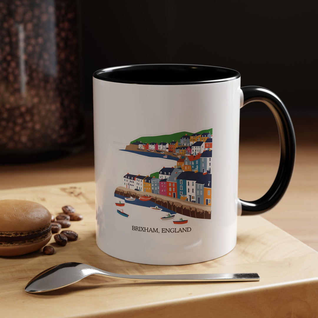 Bring the beauty of Brixham’s coastal views to your home with this charming mug. Featuring detailed artwork of the harbor and town, this mug is perfect for enjoying your favorite beverage. Dishwasher safe and microwave safe for everyday use.