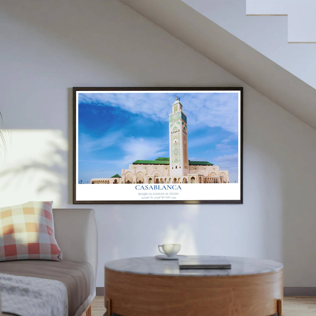 Architectural photography poster depicting Casablanca Hassan II Mosque minaret rising grandly against fluffy clouds in sky. Produced by MapYourDreams, this artwork is available in flexible options including unframed paper, custom wooden frames, and gallery canvas wraps for office wall decor.