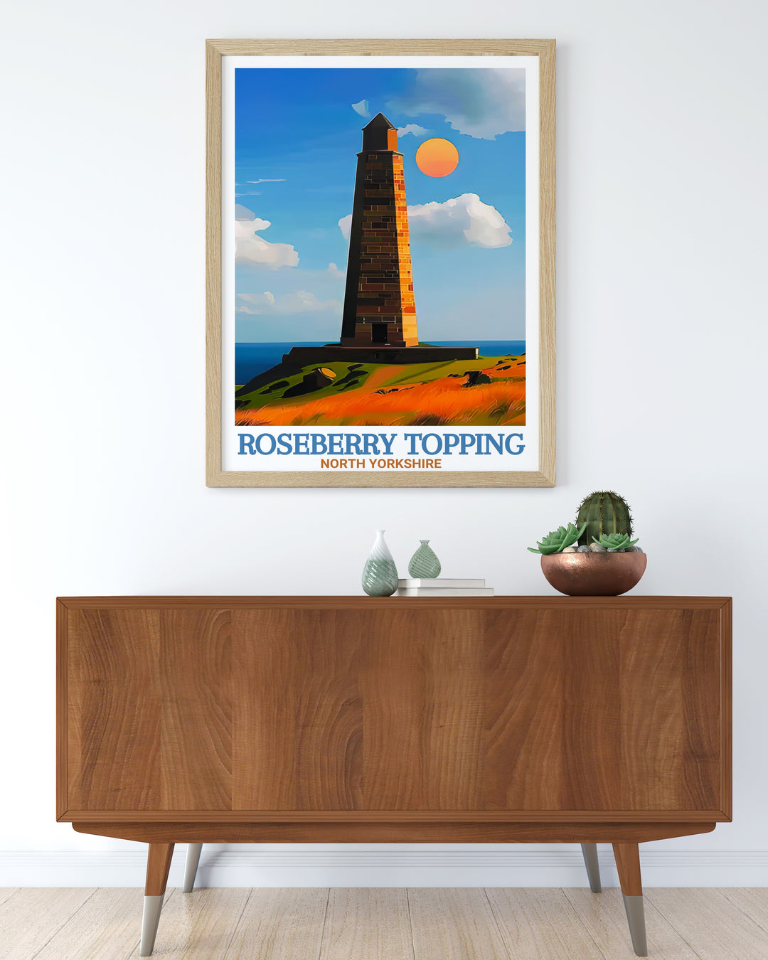 This Roseberry Topping wall art, featuring Captain Cooks Monument, brings the striking beauty of North Yorkshires North York Moors into your home. Perfect for those who love the outdoors and British history.