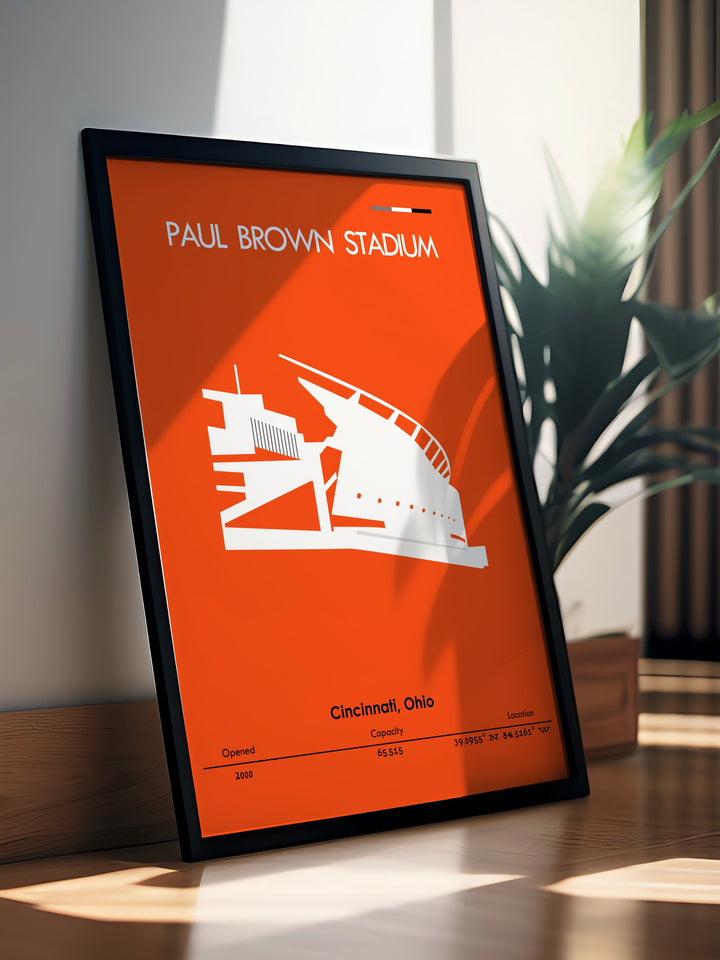 The Paul Brown Stadium framed print featuring Joe Mixon and Tyler Boyd offers a stunning representation of Cincinnati Bengals football. This modern decor piece combines a vintage NFL poster style with a bold depiction of the stadium, capturing the excitement and energy of game day.