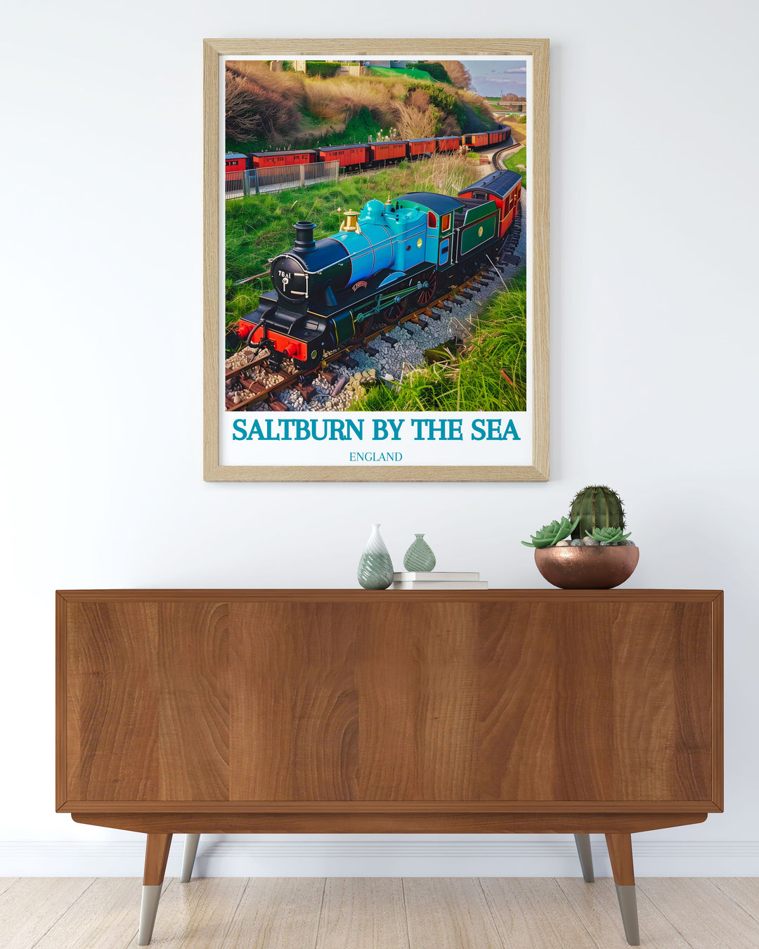 Framed print of Saltburn Miniature Railway and Saltburn Pier art bringing the charm of Saltburn by the Sea into your home a beautiful addition to your collection of Yorkshire prints and coastal decor