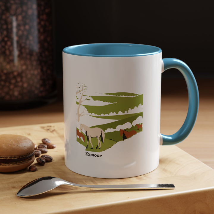 Beautifully designed Exmoor mug featuring vibrant art of Exmoor landscapes. Made from ceramic with a colorful interior and rim, it is perfect for everyday use and adds charm to your drinkware collection. Microwave and dishwasher safe for convenience.