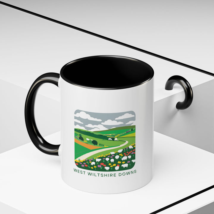 A beautifully designed West Wiltshire Downs mug celebrating the charm of the English countryside. Perfect for coffee or tea lovers, it features vibrant artwork inspired by West Wiltshire Downs landscapes. Durable and dishwasher-safe, this mug is a meaningful gift for travelers and art enthusiasts.