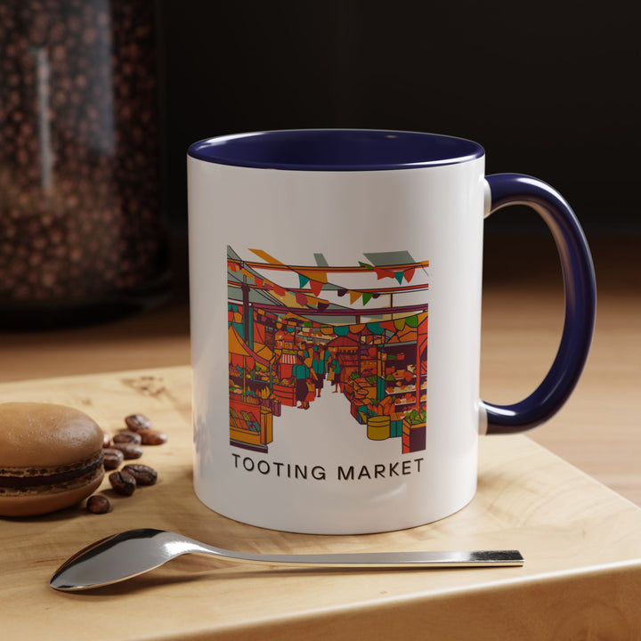 Enjoy your favorite beverage in this Tooting Market mug featuring artistic depictions of Londons iconic marketplace. Durable and dishwasher safe, it adds elegance to your daily routine. A meaningful gift or keepsake for lovers of travel and unique designs.