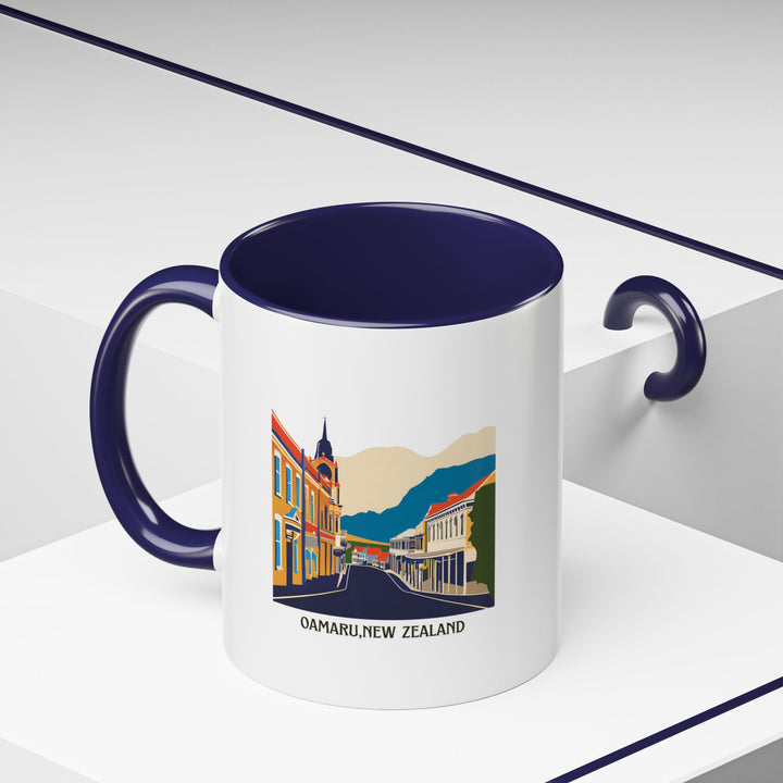 Enjoy a piece of Oamaru New Zealand with this beautifully designed ceramic mug. Featuring vibrant artwork inspired by the town’s scenic landscapes, it is microwave and dishwasher safe, making it both practical and artistic.