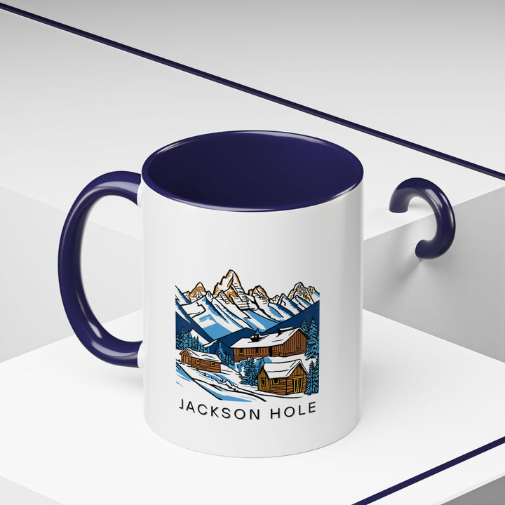 A Jackson Hole Wyoming mug with stunning artwork of the Teton Mountains. Ideal for coffee lovers, this durable mug is microwave and dishwasher safe, making it a practical addition to your kitchen or office. A perfect gift for adventurers.