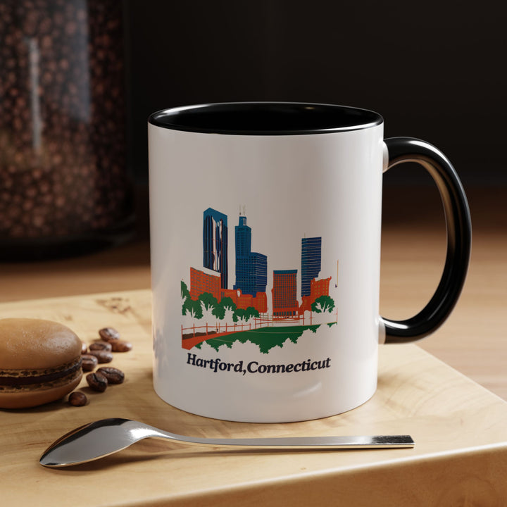 Add Hartford’s elegance to your daily routine with this ceramic mug. Featuring vibrant designs inspired by the city, it is dishwasher-safe and perfect for coffee or tea lovers. A meaningful keepsake for travelers and fans of Hartford.