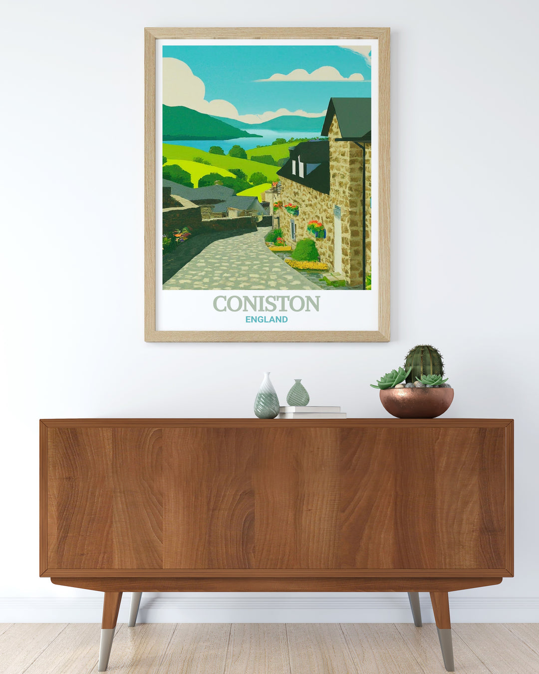 Coniston Village wall art, depicting the tranquil waters of Coniston and the charming village, set amidst the Lake Districts rolling hills, a perfect piece for those who love the natural beauty of England.