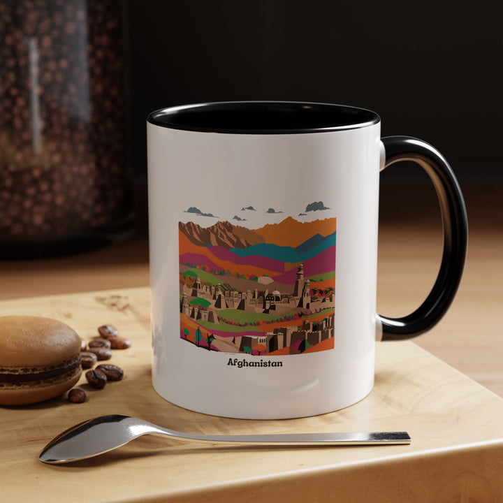 A vibrant Afghanistan Mug with intricate designs that highlight the beauty of Afghan culture and landscapes. This durable ceramic mug is dishwasher and microwave safe, making it an excellent choice for coffee lovers and as a unique Afghan-inspired gift.