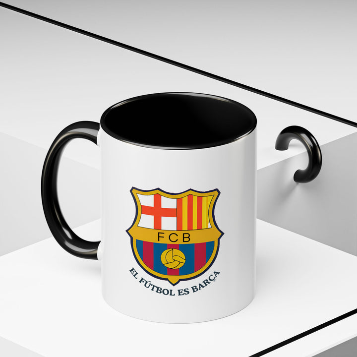 Enjoy a piece of Barca every day with this ceramic mug showcasing stunning artwork inspired by the city. Dishwasher-safe and practical, it is perfect for coffee or tea lovers and makes a meaningful gift for fans of Barca’s spirit.