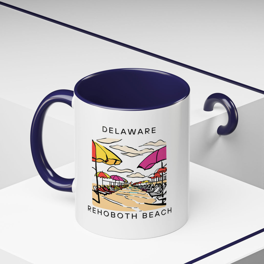 Add a touch of Rehoboth Beach to your morning routine with this ceramic mug. Featuring scenic beach imagery, it’s perfect for sipping coffee, tea, or any hot beverage. Dishwasher and microwave safe for easy care, it’s a beautiful gift for coastal lovers.