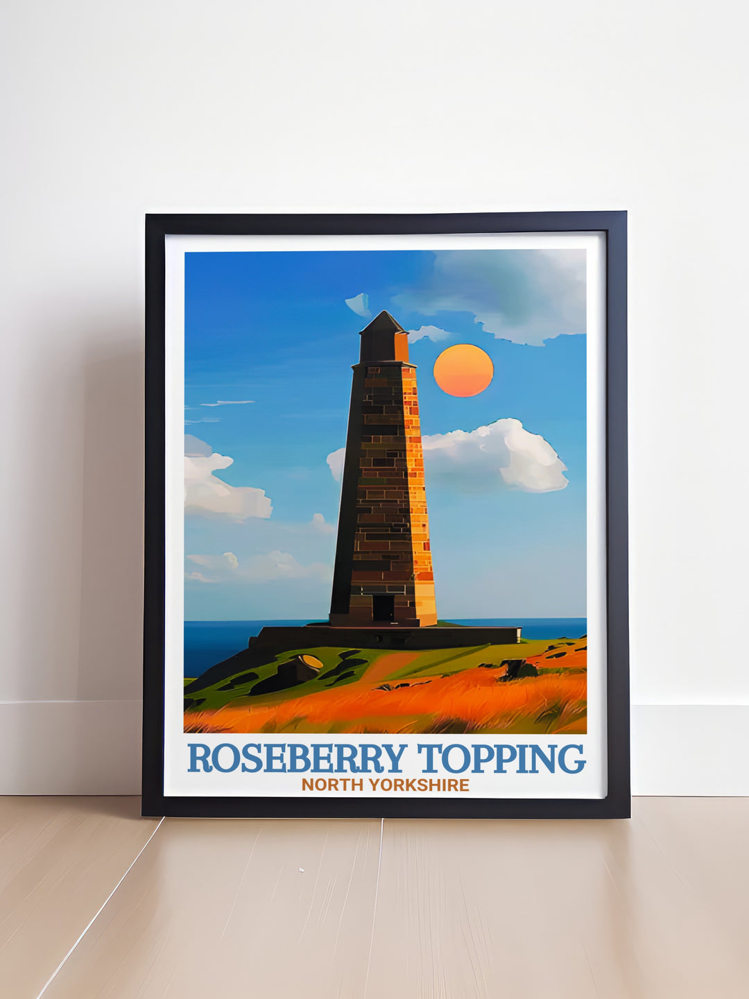 This travel print captures the essence of Roseberry Topping and Captain Cooks Monument, two iconic landmarks of North Yorkshire. A perfect addition to any home decor, it celebrates the natural and historical beauty of the North York Moors.