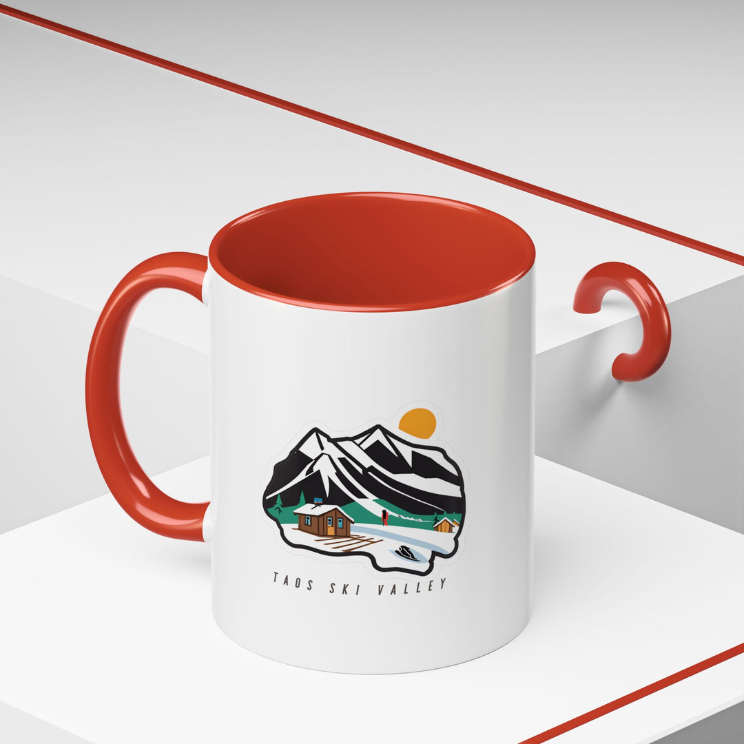 This Taos Ski Valley Mug highlights the area's beauty with intricate artwork of famous peaks and scenic views. Durable and dishwasher-safe, a perfect gift or personal keepsake for those who appreciate mountain charm and artistic design.