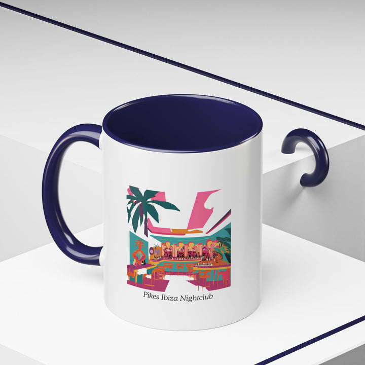 The Pikes Ibiza Night Club Mug is a vibrant ceramic cup celebrating the nightlife of Ibiza. Featuring intricate artwork, it is dishwasher safe and perfect for personal use or as a keepsake for fans of Pikes Ibiza.