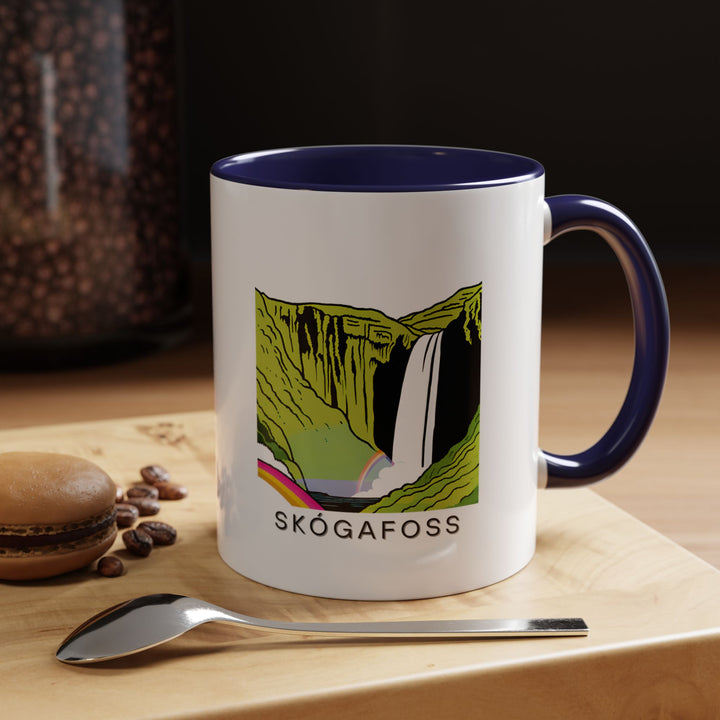 A stunning Skógafoss Iceland mug featuring intricate artwork of the famous waterfall. This ceramic mug is perfect for hot drinks and adds an artistic touch to your collection. Ideal for gifting or personal use, it’s a beautiful reminder of Iceland’s natural wonders.