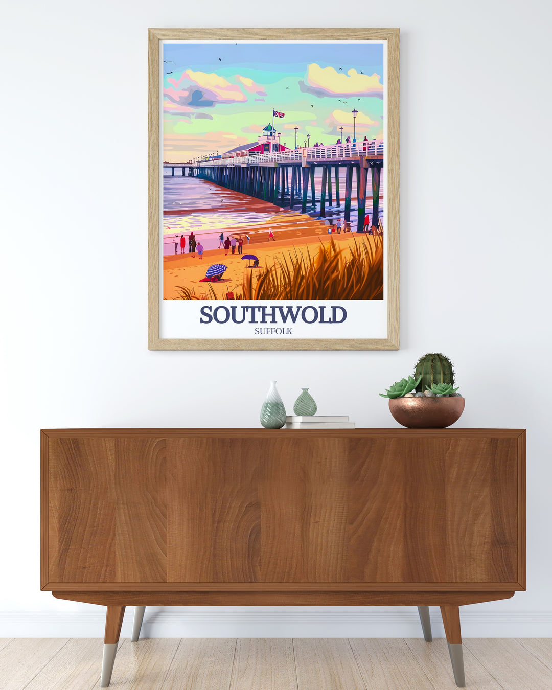 Vintage Travel Print featuring the scenic Southwold Pier and Southwold Pier North Sea. This artwork is perfect for those who appreciate coastal beauty and want to bring a piece of Southwold into their home. Ideal for modern and vintage decor.