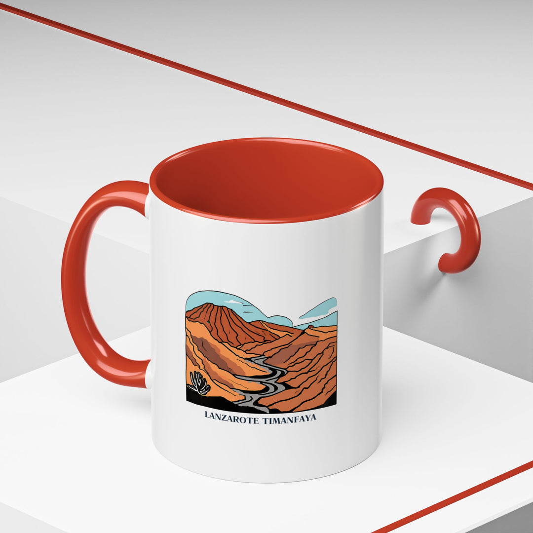 The Lanzarote Timanfaya National Park mug is a wonderful way to enjoy your favorite hot drinks. With detailed artwork of the volcanic park, this mug brings the stunning landscapes of Lanzarote to your home. Ideal for gifts or personal use, it is microwave and dishwasher safe. Sip your favorite beverages in style with this Timanfaya National Park mug. Showcasing the v