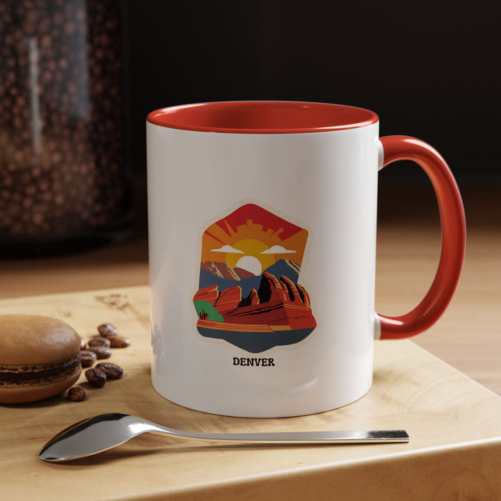 A Denver mug featuring vibrant designs inspired by the Mile-High City. Crafted from durable ceramic, it is dishwasher and microwave safe, making it a perfect keepsake or gift for coffee lovers and fans of Denver’s iconic charm and landmarks.