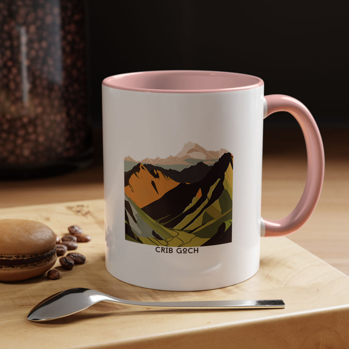 Enjoy the beauty of Crib Goch with this artistic ceramic mug showcasing the iconic ridge. Durable and dishwasher safe, it is ideal for personal use or as a meaningful gift for hikers and fans of Wales’ natural wonders.