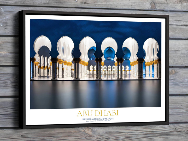 Night view of Abu Dhabi Sheikh Zayed Grand Mosque showing illuminated arches and mirror reflection pool. Offered by MapYourDreams, this artwork is available in flexible options including unframed paper, custom wooden frames, and gallery canvas wraps to suit any wall art decor style perfectly.