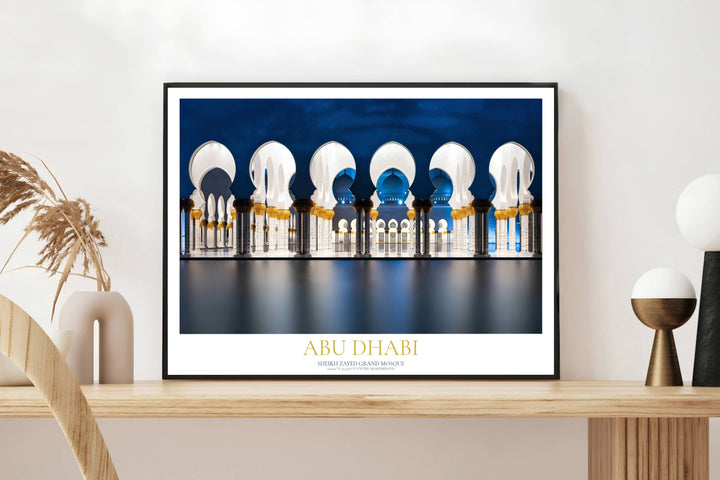 Architectural reflection poster of Sheikh Zayed Grand Mosque in Abu Dhabi under deep twilight sky. Crafted by MapYourDreams, this print is available in versatile presentation choices like unframed matte paper, solid wood framed designs, and stretched canvas options for home wall art decor.