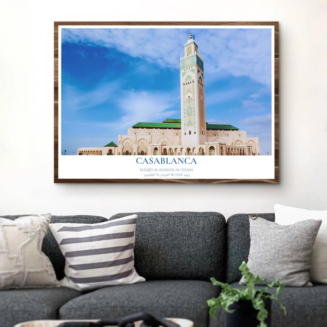 Fine art photo poster of Hassan II Mosque in Casablanca Morocco with latitude and longitude coordinate text at the base. Released by MapYourDreams, this artwork is available in flexible options including unframed paper, custom wooden frames, and gallery canvas wraps for home wall art.
