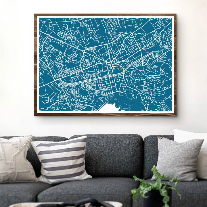 Minimalist street lines form a beautiful abstract geometric pattern in this horizontal road map poster of Tirana, Albania. MapYourDreams provides flexible choices like unframed archival paper, custom frames in various finishes, and stretched canvas.