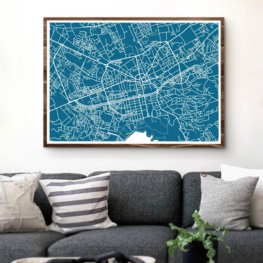 Minimalist street lines form a beautiful abstract geometric pattern in this horizontal road map poster of Tirana, Albania. MapYourDreams provides flexible choices like unframed archival paper, custom frames in various finishes, and stretched canvas.
