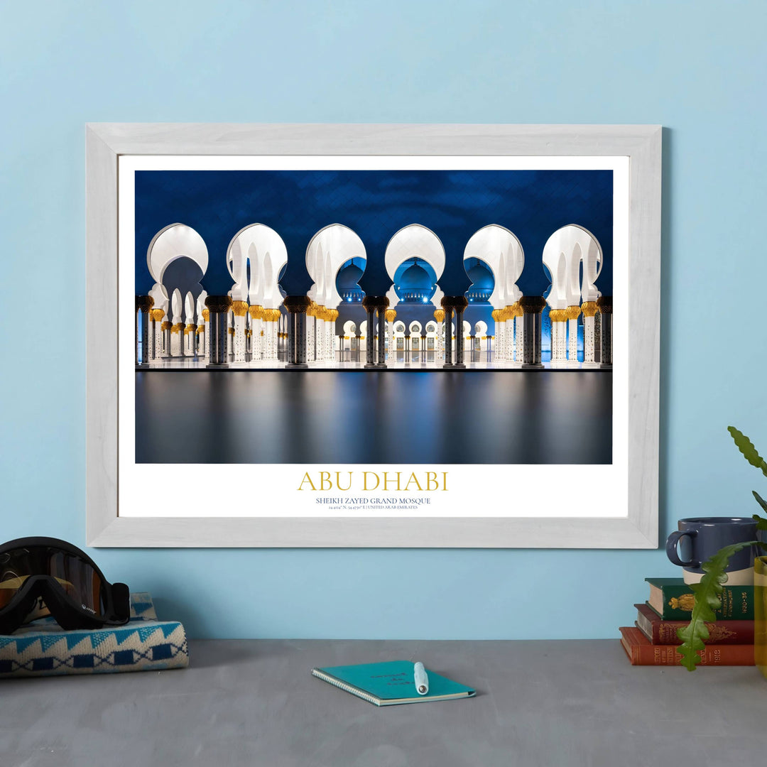 Serenely lit Sheikh Zayed Grand Mosque columns in Abu Dhabi capturing grand Moorish arches. Handcrafted by MapYourDreams, this artwork is accessible in flexible finishes like unframed art paper, custom wood framed units, and high grade canvas wraps for stunning home wall decor.