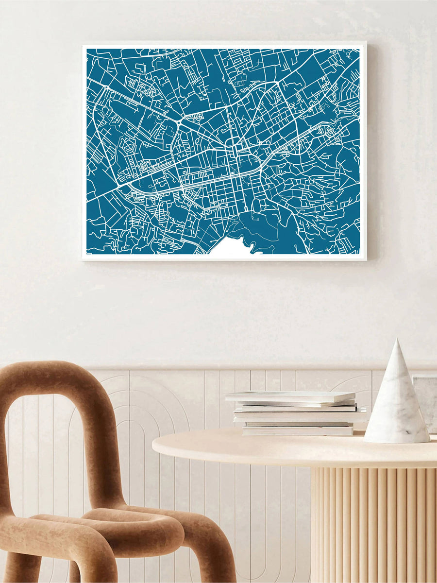 Pure white linework contrasts sharply against a deep teal-blue field in this elegant Tirana map poster featuring wide landscape framing. Offered by MapYourDreams in custom choices such as unframed paper, wood-framed options, and gallery-style canvas.