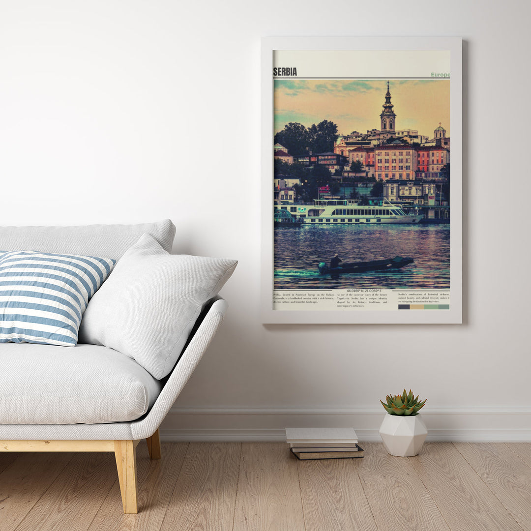 a white couch sitting in a living room next to a white wall