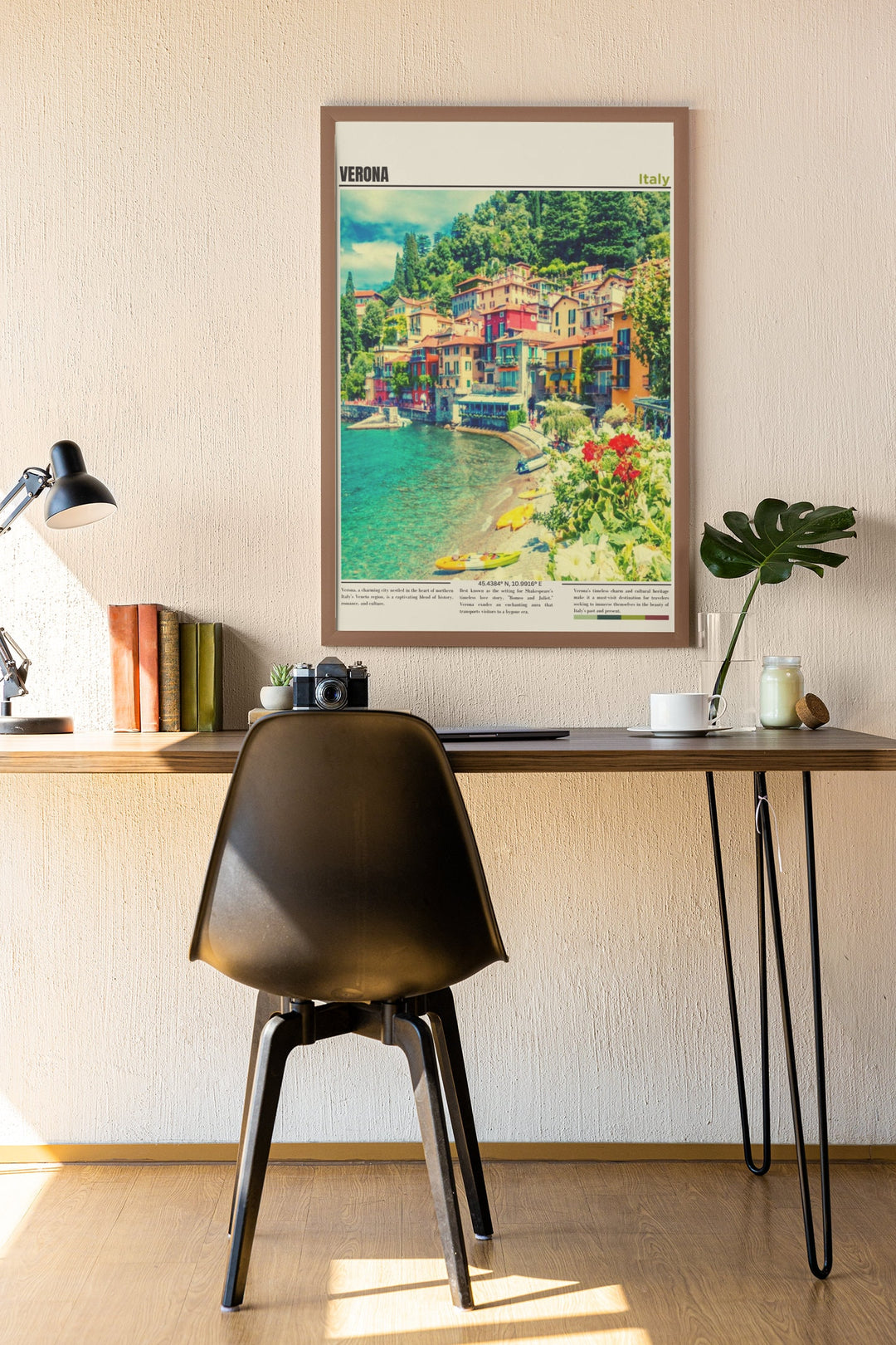 a desk with a chair and a painting on the wall