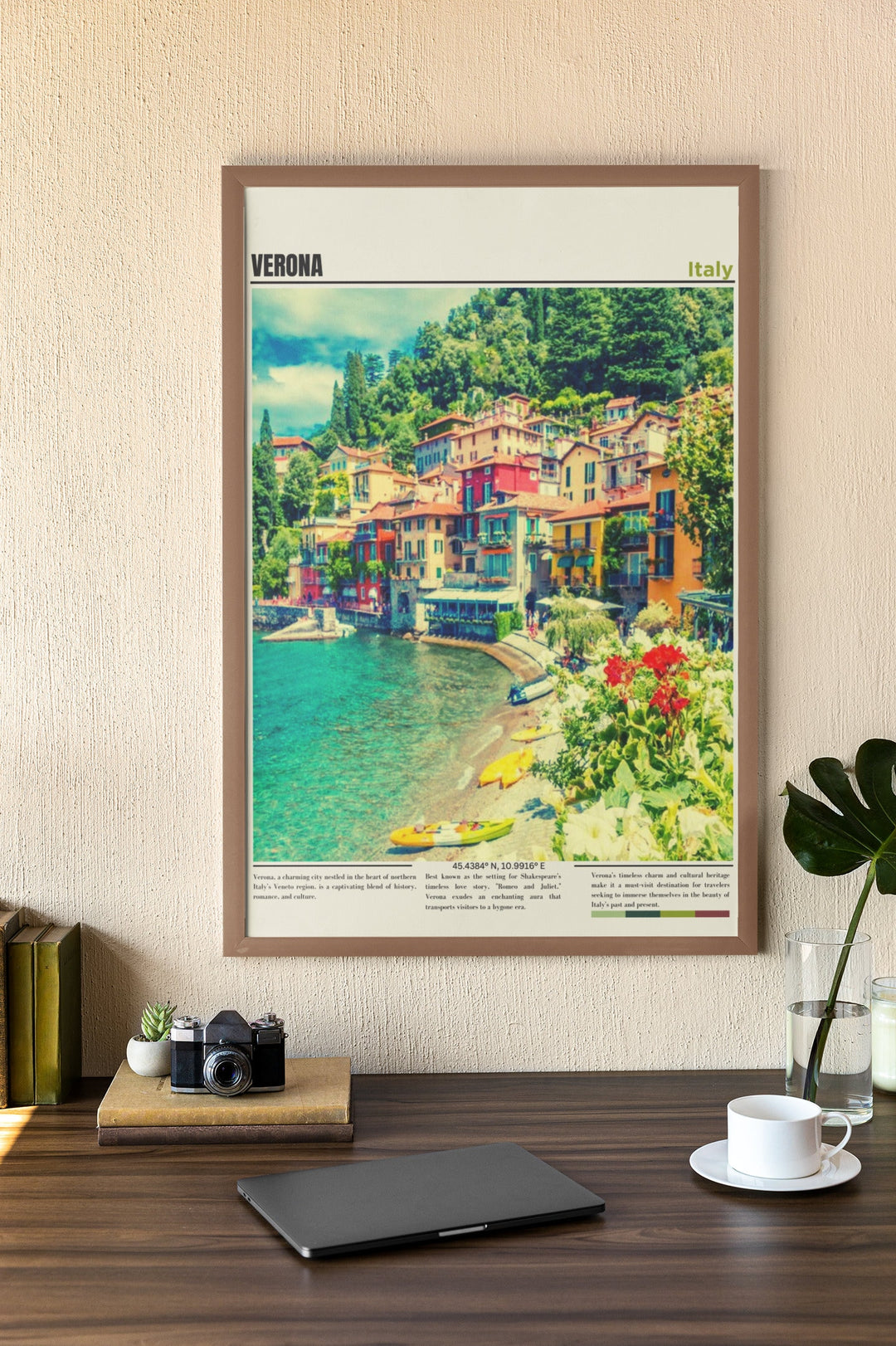 a picture of a town on a wall above a desk