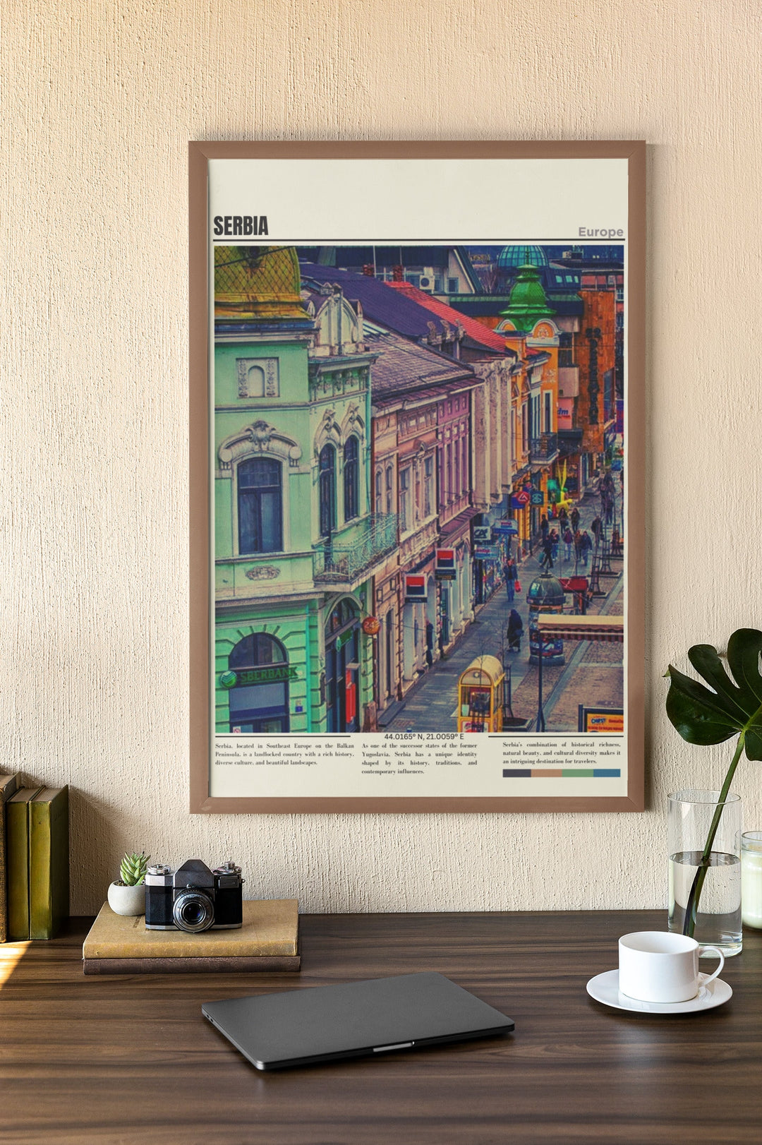 a picture of a city street with a laptop on a desk