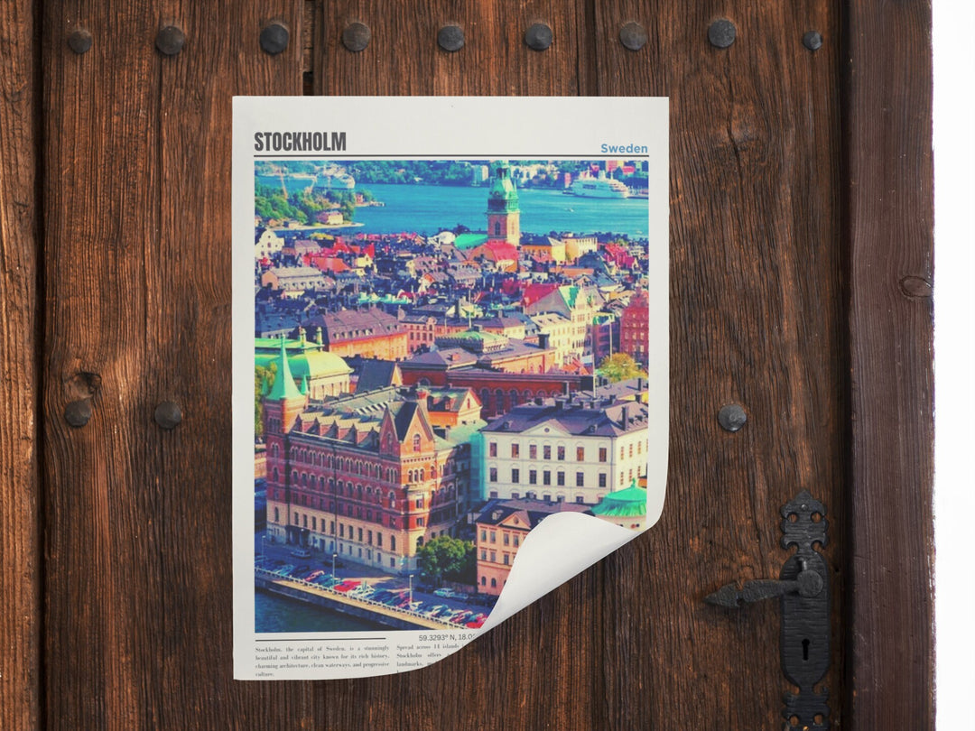 a picture of a city is taped to a wooden door
