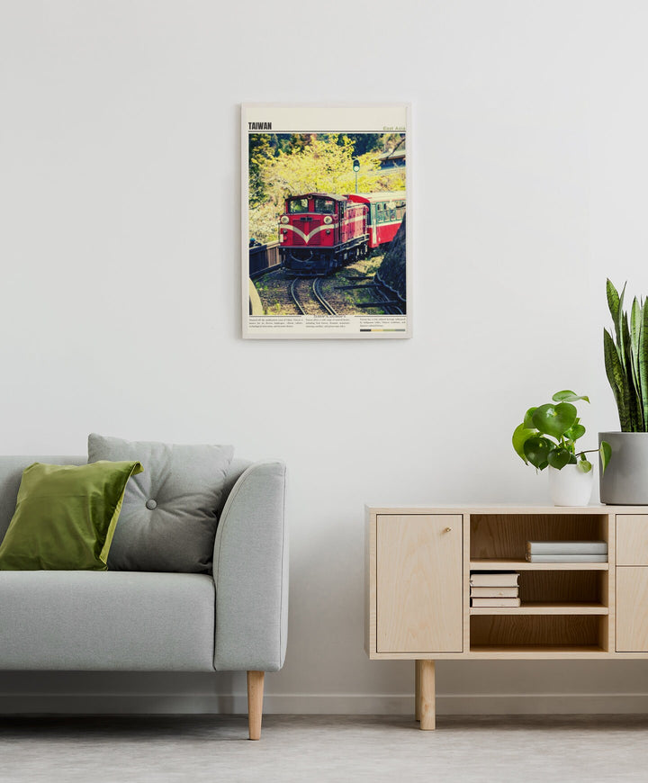 a living room with a couch and a painting on the wall