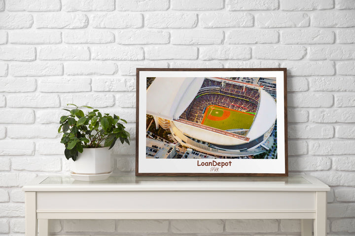 a picture of a baseball stadium with a plant on a table
