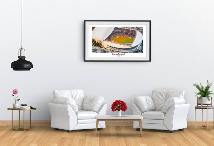 a living room with two white chairs and a coffee table