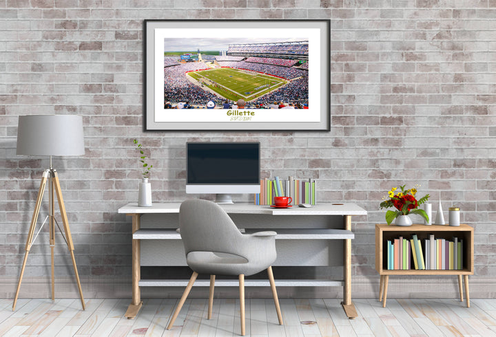 a picture of a football stadium with a computer on a desk