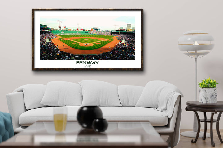 a living room with a couch and a baseball field