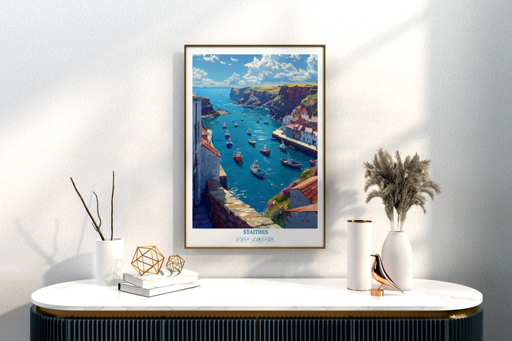 An England wall decor piece depicting the idyllic scenery of Staithes, complete with traditional fishing boats and charming stone buildings.