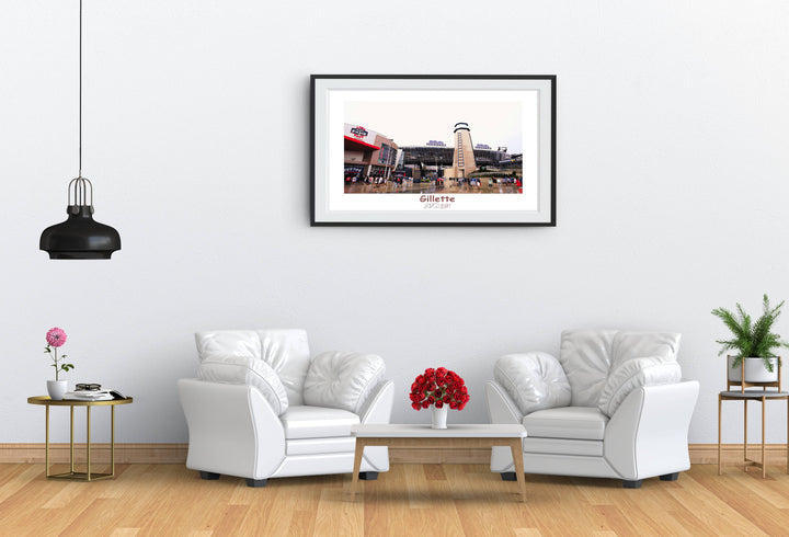 a living room with two white chairs and a coffee table