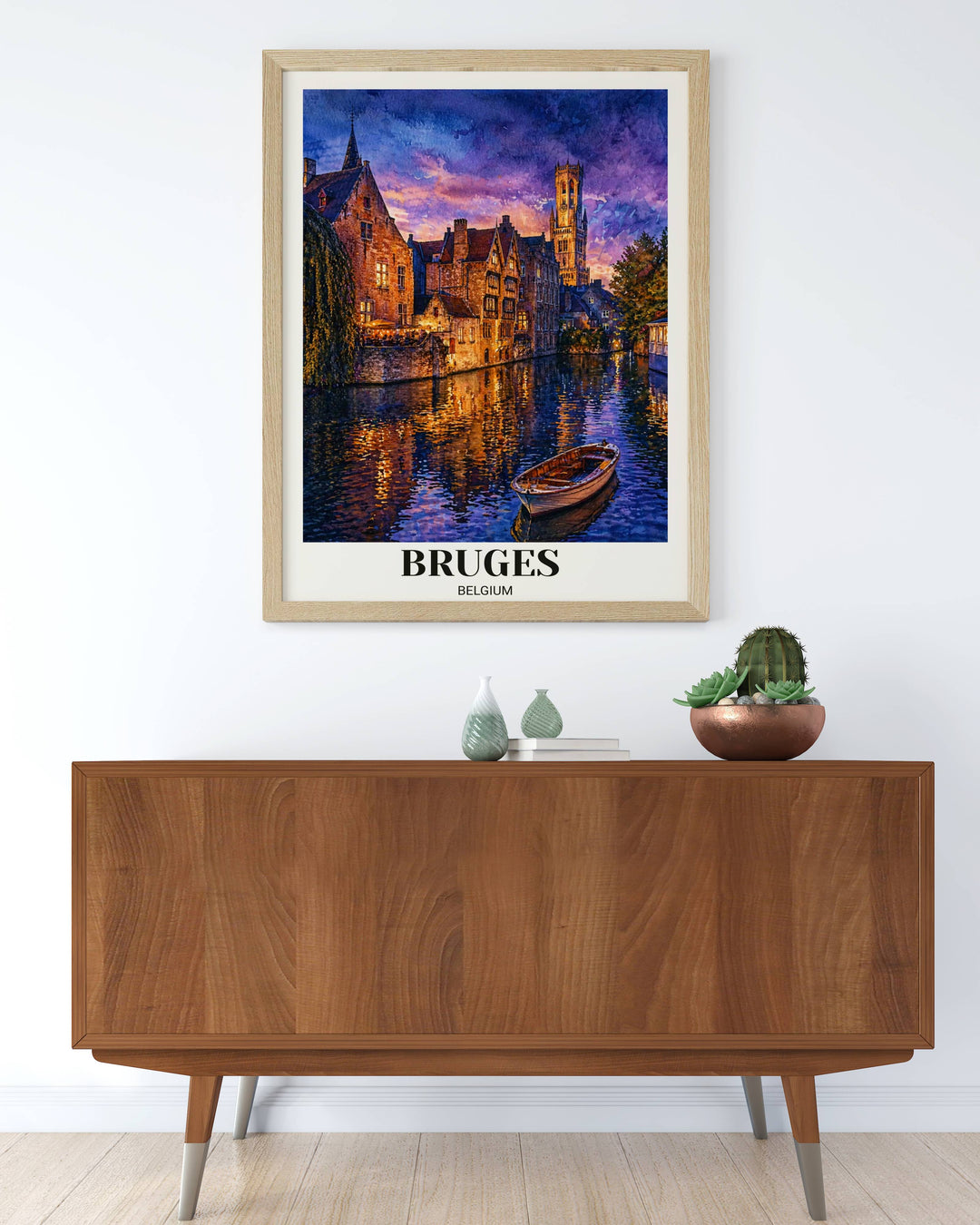 Detailed watercolor illustration of the Belfry of Bruges and canal-side villas, styled in a natural wood frame for a warm, travel-inspired interior aesthetic.