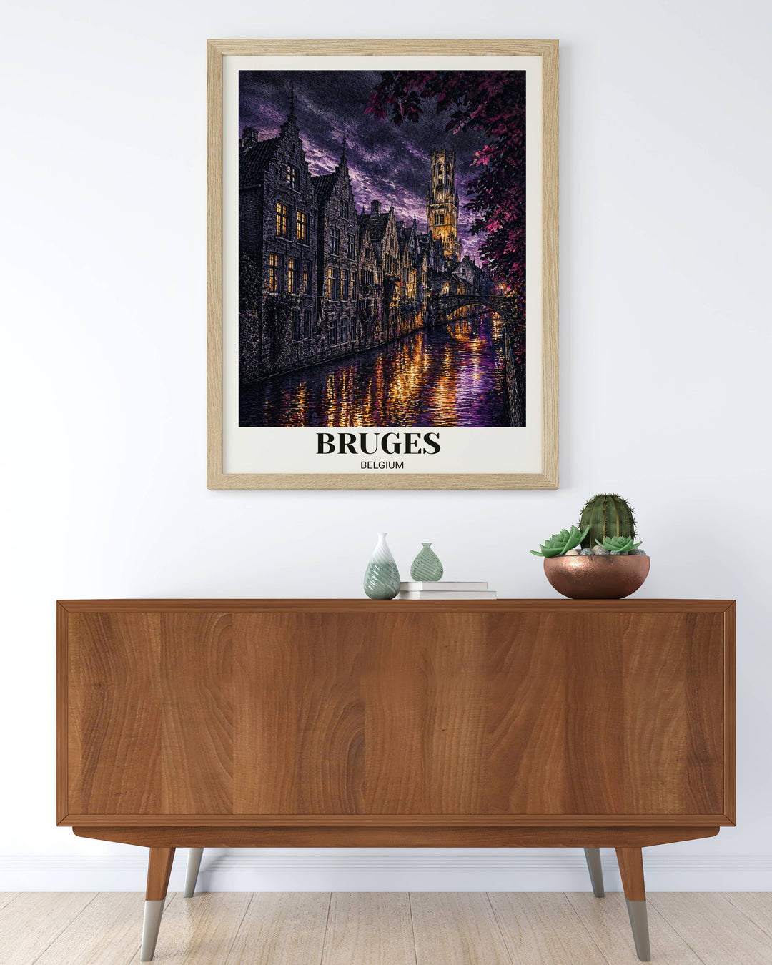 Moody Bruges canal art print with a professional off-white border, showcasing the historic belfort tower and vibrant magenta leaves, styled in a natural wood frame for home decor.