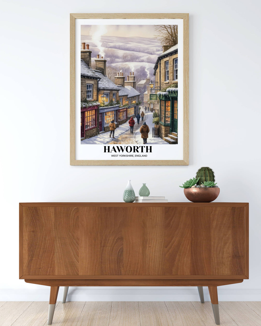 Vertical winter travel poster of Haworth England with elegant serif typography and a built-in gallery-matted border on 200gsm archival stock.