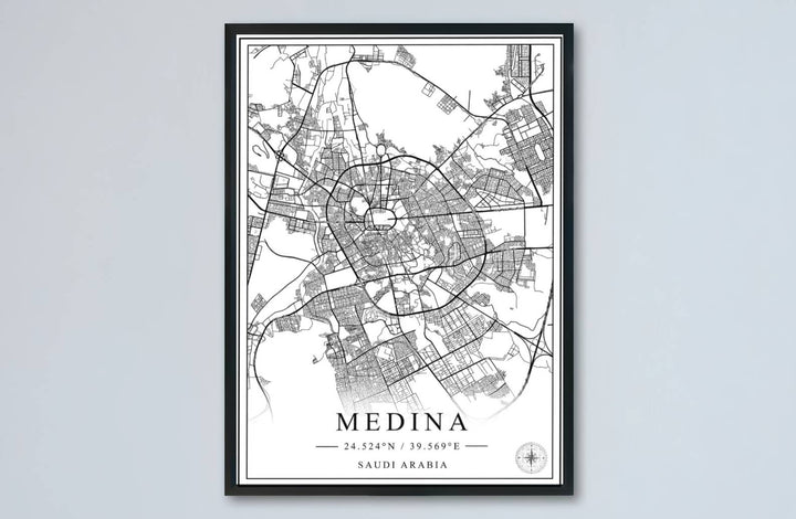 Minimalist map art print of Medina Saudi Arabia showcasing refined black line art and elegant white background contrast. Made by MapYourDreams, this artwork is available in flexible options including unframed paper, custom wooden frames, and gallery canvas wraps for living space wall art.