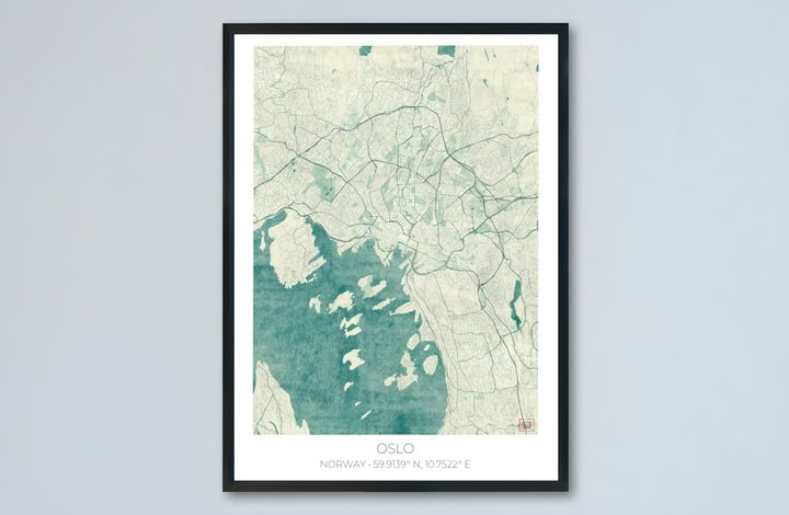 Nautical cartographic print of Oslo Norway displaying the city street network, water channels, and island topography in vintage blue tones. Designed for contemporary interiors, this piece is offered as an unframed paper poster, solid wood framed print, or gallery wrapped canvas wall decor.