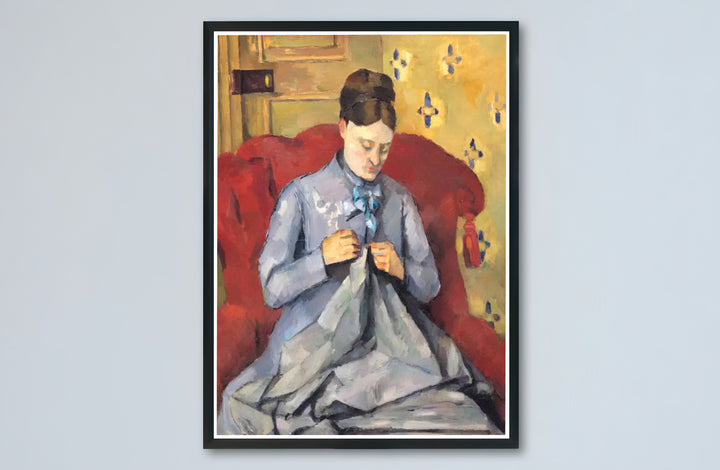 Historic French interior fine art print of Paul Cezanne Madame Cezanne Sewing 1877 set in a cozy room in Paris France. Buy high-definition framed prints, unframed paper wall decor, and gallery canvas choices directly from MapYourDreams for artistic setups.