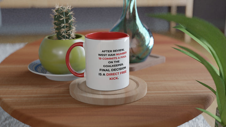 Unique Gooner gifts idea showing a dual-tone red football banter coffee cup with a detailed VAR replay review decision ruling a West Ham goal offside.