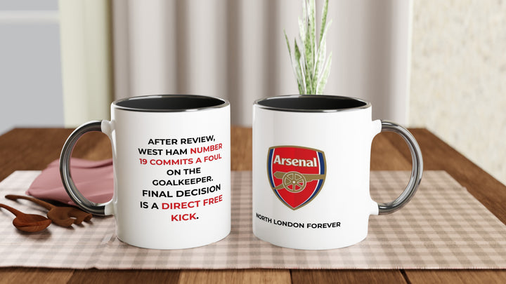 Sleek black Arsenal fc mug from MapYourDreams displaying the iconic VAR review text block with West Ham number 19 foul details in striking white typography.